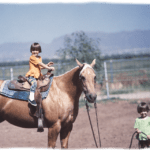 Twin Girls With Palomino Quarter Horse