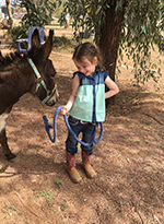 Rice Quarter Horses girl with donkey